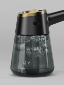 Element Black glass bubbler partially filled with bubbling water
