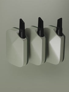 Three Compass Rise batteries standing upright in Sage colorway