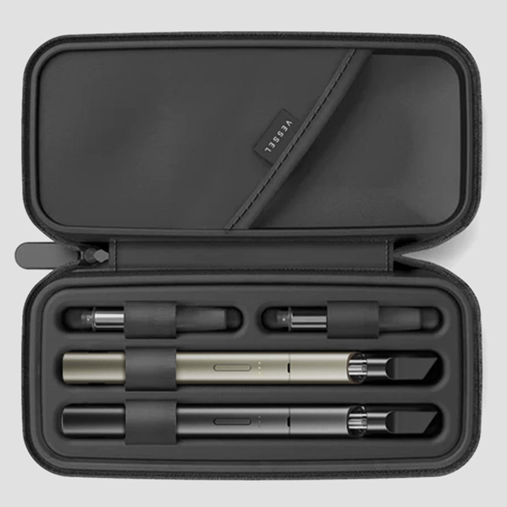 Vessel Vista Edge 510 thread batteries in Sage and Slate colors displayed in open black Rover pen style carry case with additional cartridges