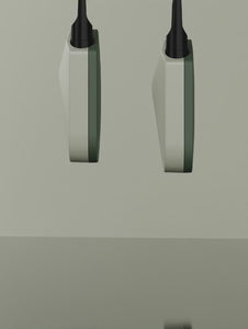 Two Compass Rise batteries shown side by side in profile view